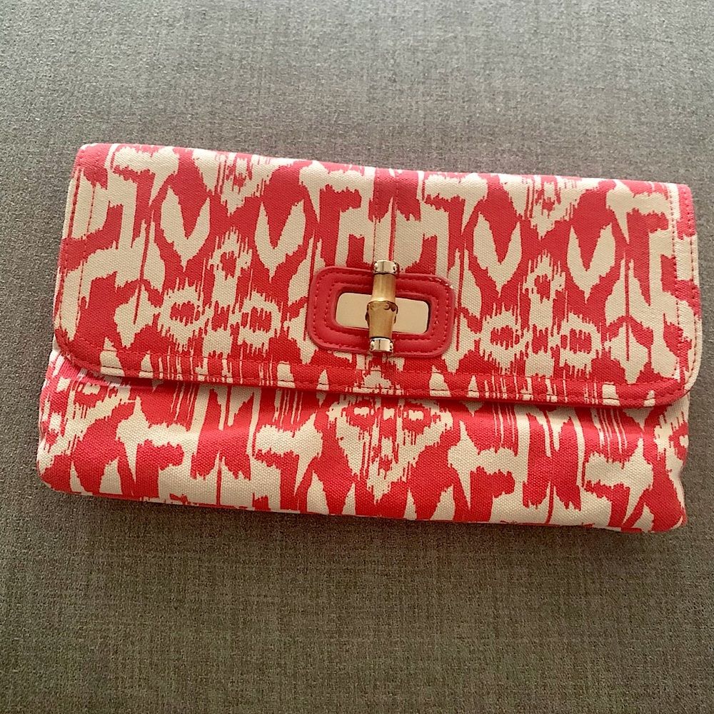 Chicos red and white patterned clutch bag